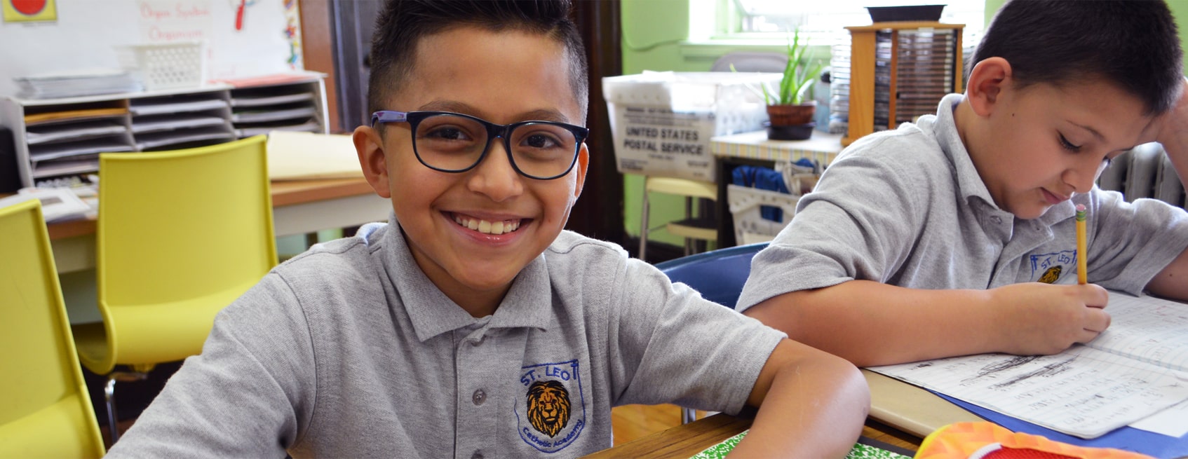 Catholic school student smiling at camera