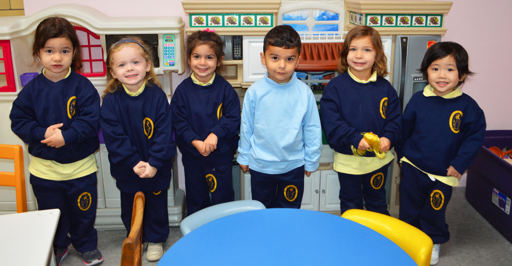 Catholic school students smiling at camera